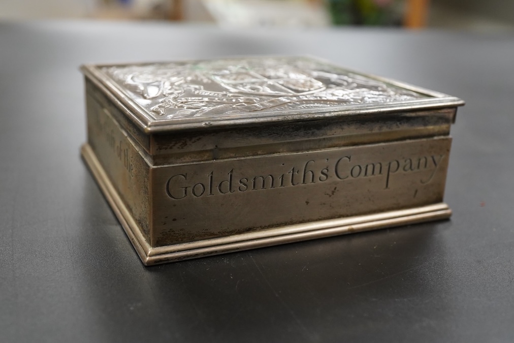 A George V silver Goldmsiths Company presentation table cigarette box 9.2 x 9.2 cm., weight approx. 9.55ozt